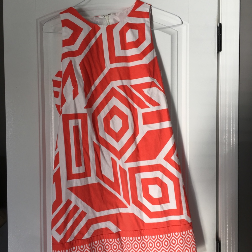 Orange and white pattern knee length dress